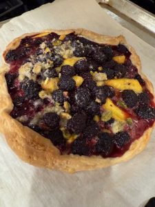 Peach blackberry galette with cardamon pistachio streusel